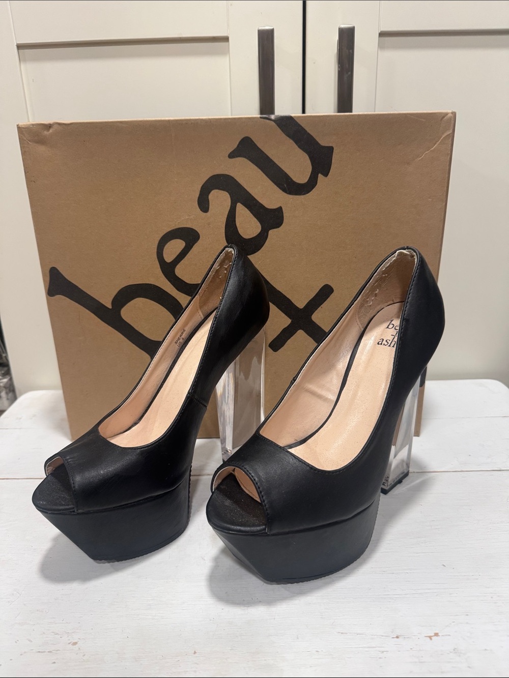 Black Peep-Toe Platform Pumps with Clear Block Heel